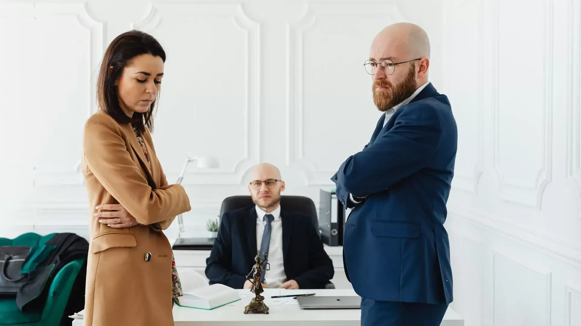 Angry couple standing in front of a divorce therapist at Mississauga Divorce Counselling Therapy, illustrating the importance of setting healthy boundaries during and after separation.